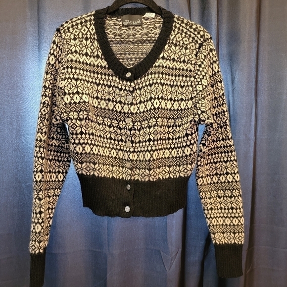 She said vintage wool sweater. - Picture 2 of 4